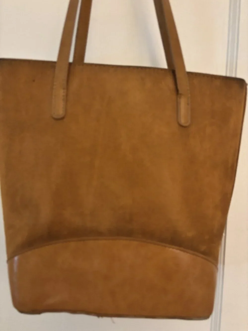 The Kate Spade New York tan suede and leather tote bag with bow